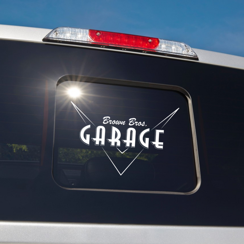 Brown Bros. Garage logo decal on a truck's rear window