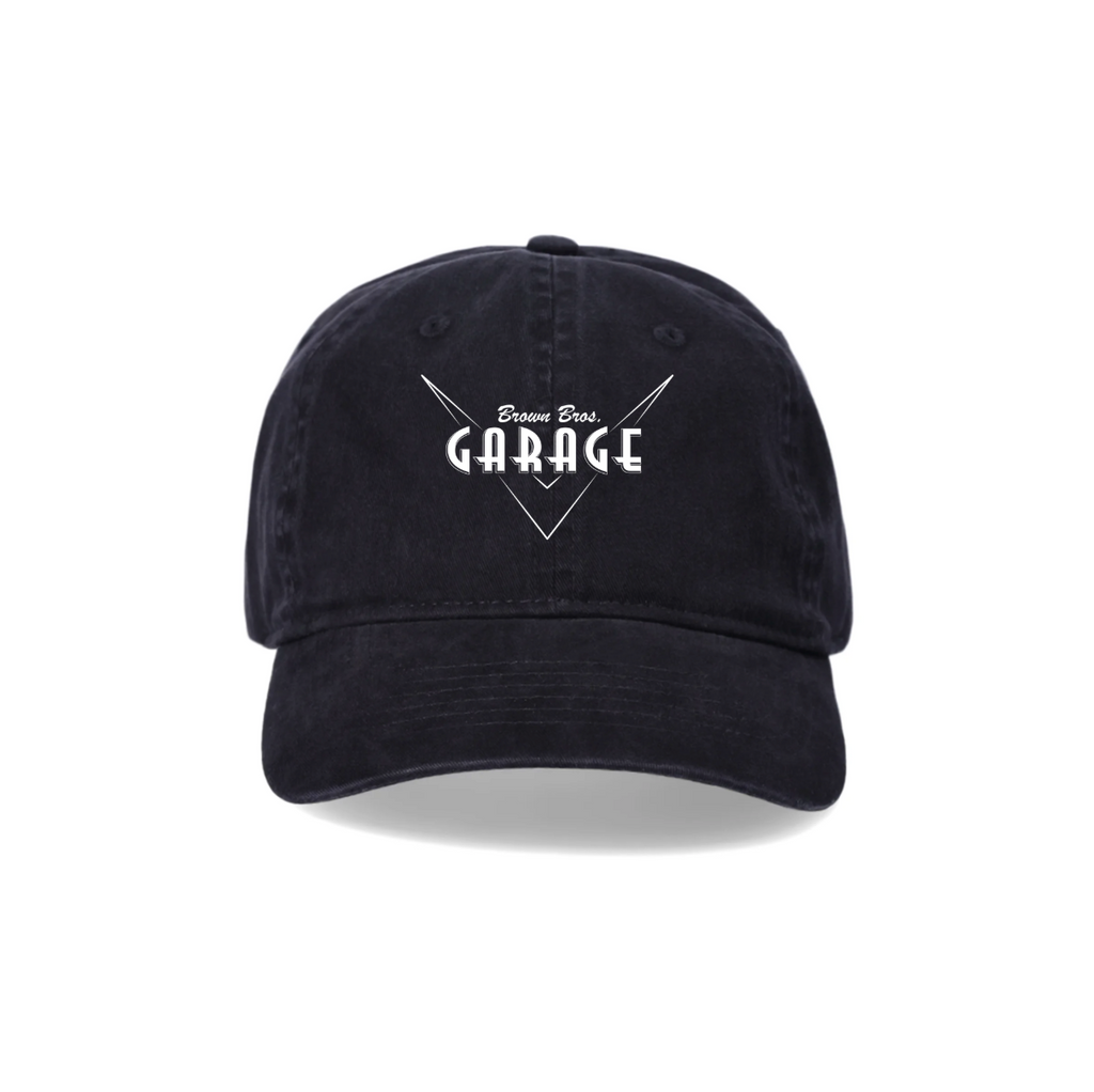 Black dad hat with the embroidered Brown Bros. Garage logo