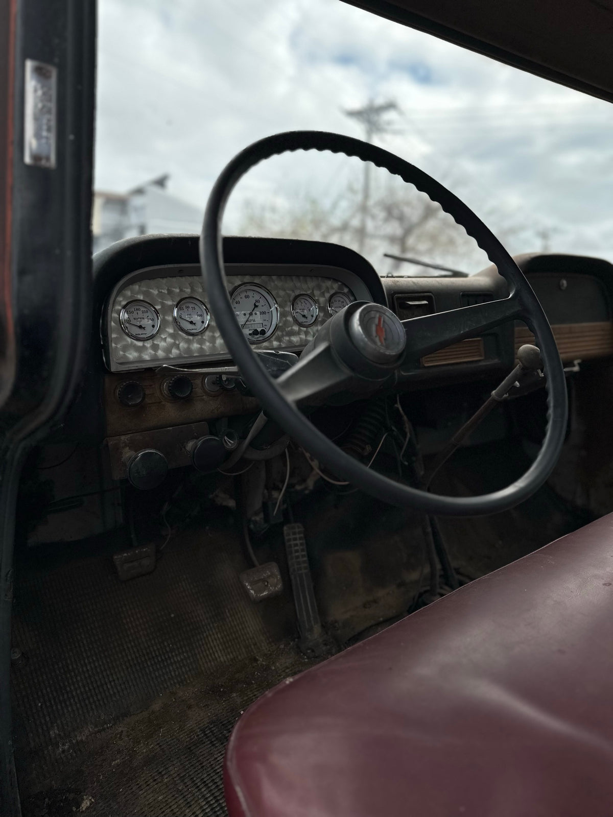 Gauge cluster in the dash of a classic Chevy truck cab