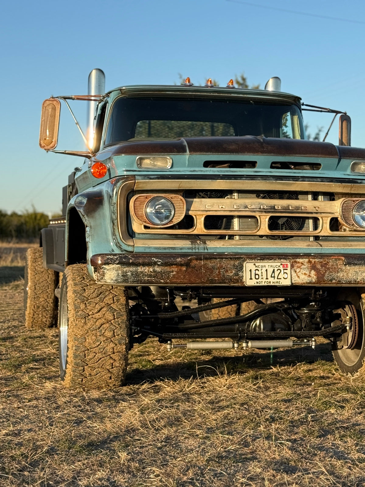 Front of Eeyore, the blue 1962 Chevy Viking, on big tires