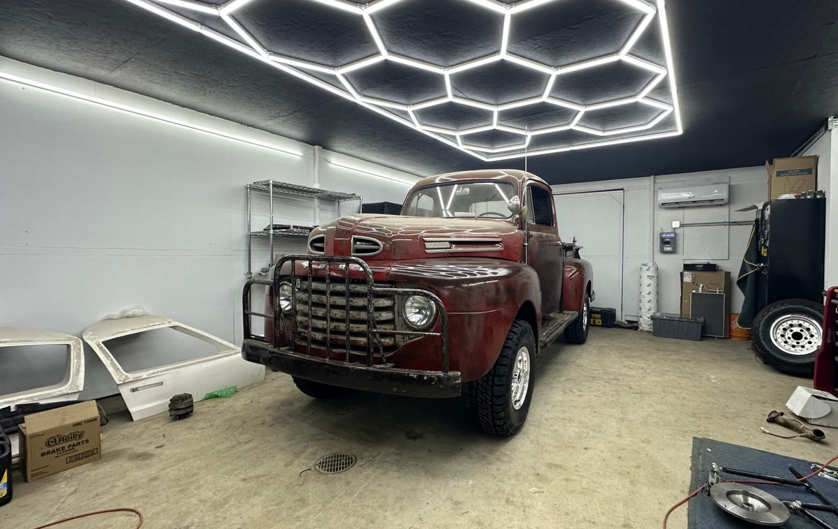 1949 Ford F1 under the hex lights in the Brown Bros. shop