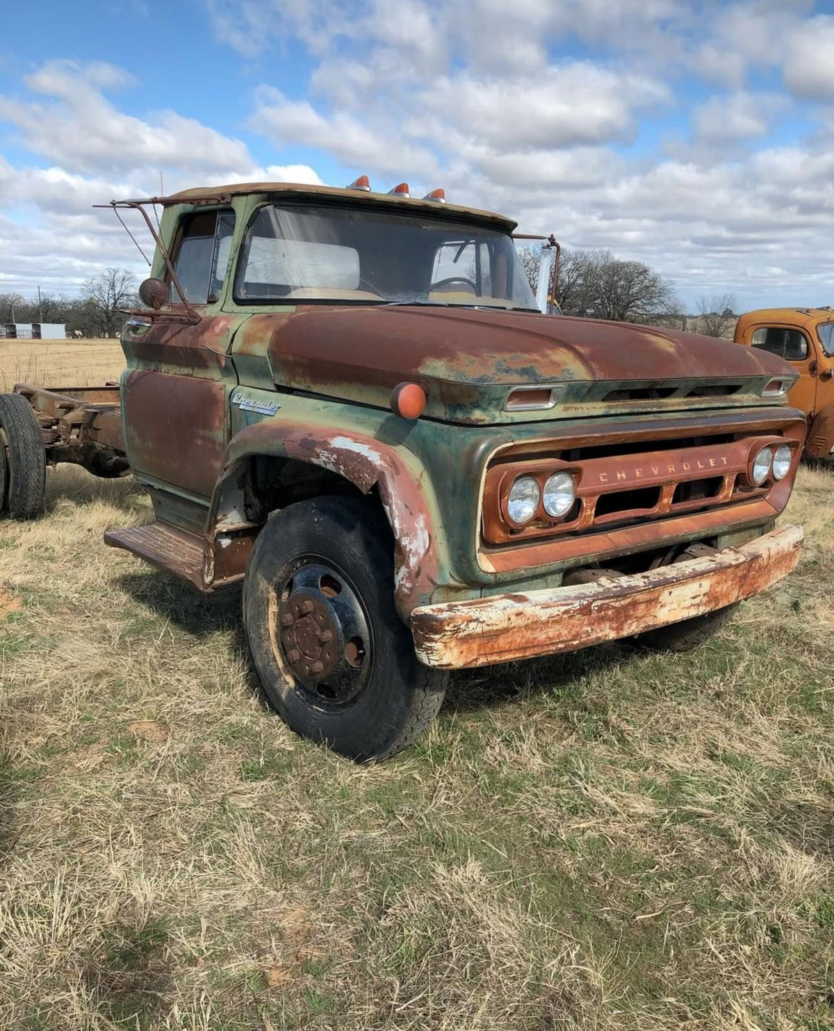 Old truck cab sitting in a field near Boyd, Texas