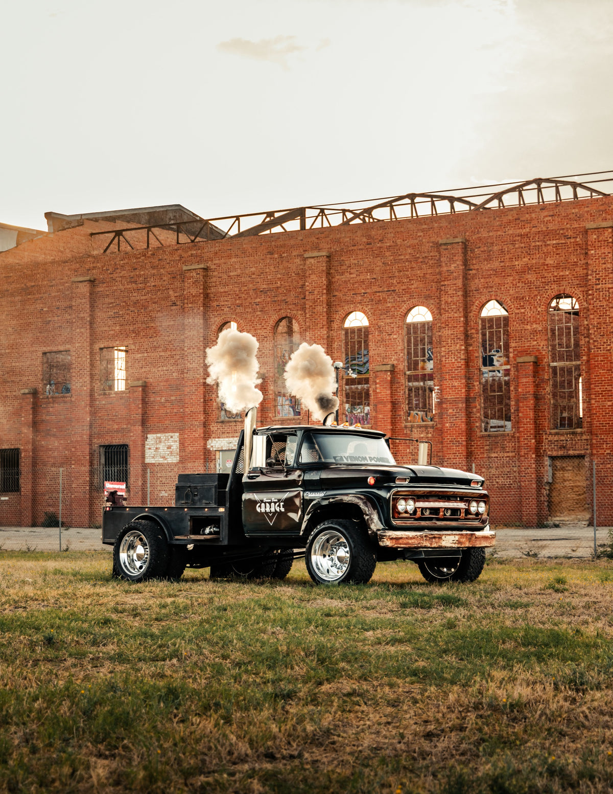 General Lee, the 1960 Chevy C60 Viking, in front of a brick building